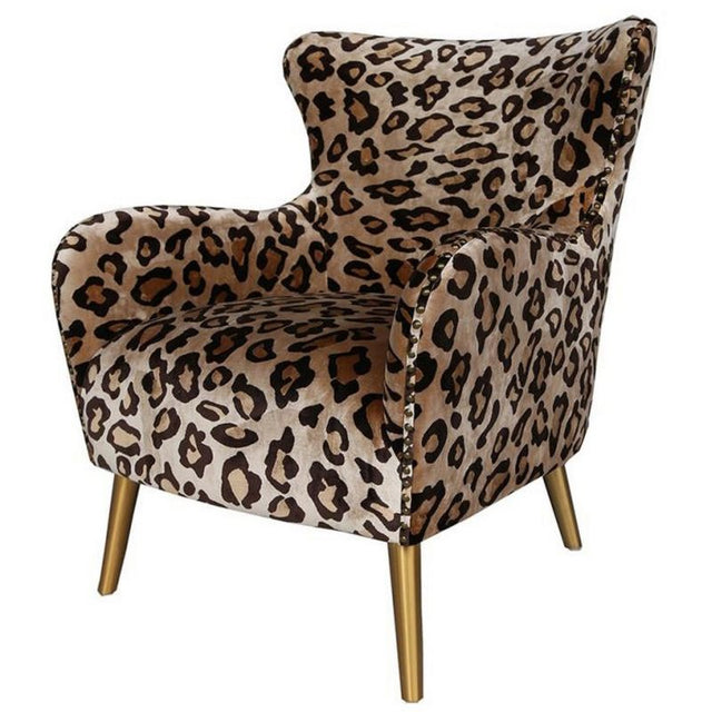 High-backed SERENGETI armchair in printed velvet with antique brass legs, perfect for stylish living spaces.