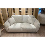 Elegant ivory corduroy 2-seat sofa with plush cushions and solid wood frame, perfect for stylish living spaces.