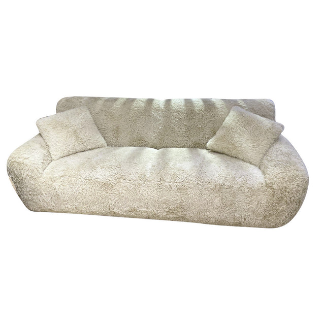 Luxurious sand-colored St Moritz 3-seat sofa with sherpa look, solid wood frame, and plush foam cushions for ultimate comfort.