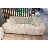 St Moritz 3 Seat Sofa in sand color with luxurious sherpa look, solid wood frame, and foam cushions for ultimate comfort.