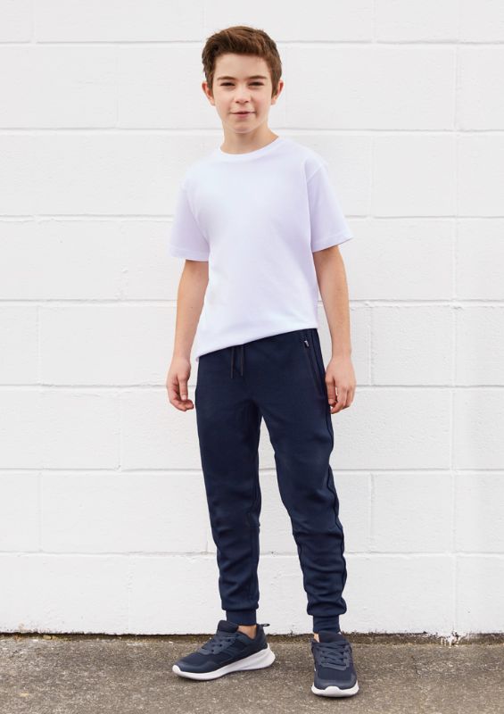 Kids Neo Pant in navy, featuring adjustable waistband, zippered pockets, and modern slim fit, ideal for active wear.