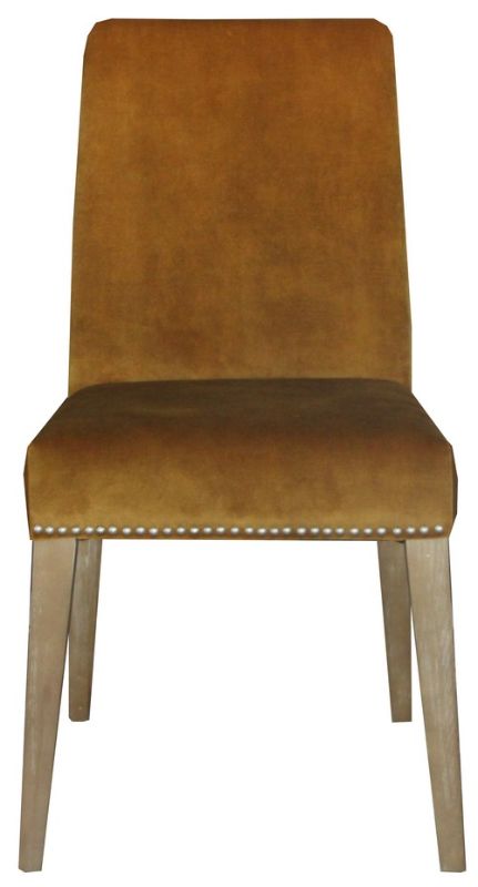 Pascal Dining Chair in Dark Mustard Velvet with antique studs, showcasing luxury and elegance for any dining space.