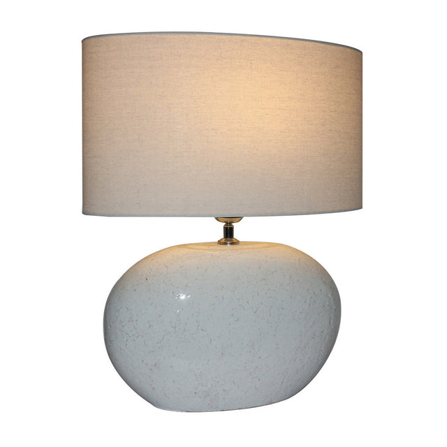 Elegant white terracotta lamp with natural linen shade, perfect for adding warmth and sophistication to any space.