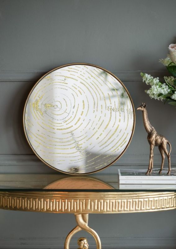 Charming 28.5cm giraffe ornament in copper finish, adding whimsical style to home decor and perfect for display on tables or shelves.