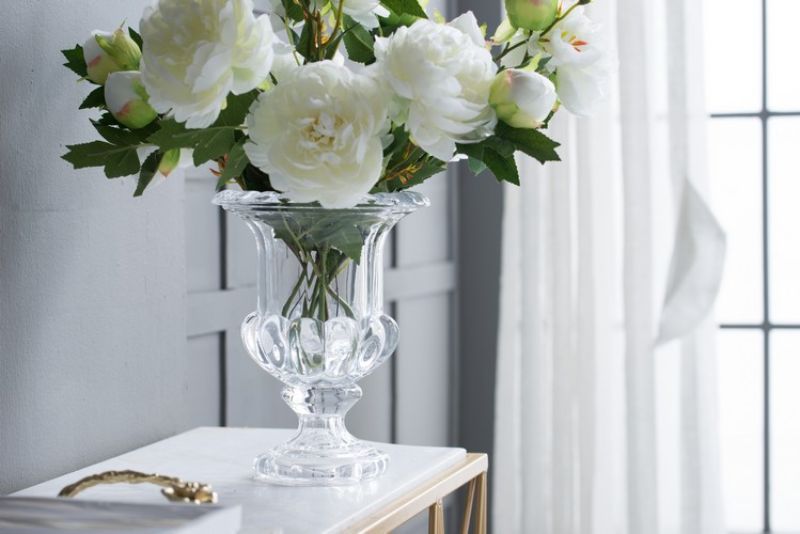 Large Omari Crystal Urn Vase in elegant glass, showcasing a unique curvaceous design, perfect for flowers or as a standalone decor piece.