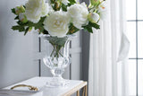 Large Omari Crystal Urn Vase in elegant glass, showcasing a unique curvaceous design, perfect for flowers or as a standalone decor piece.
