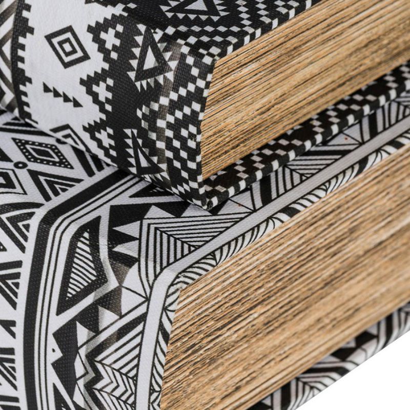 Stylish assorted book boxes with black and white geometric patterns for hidden storage and elegant home decor.