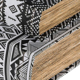 Stylish assorted book boxes with black and white geometric patterns for hidden storage and elegant home decor.
