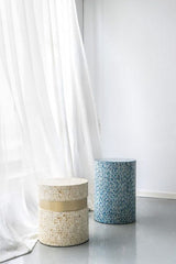 Geometric tan and gold footstool with capiz inlay, perfect as a stylish accent or functional side table.