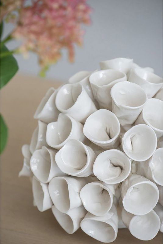 Coral ceramic ornament, 14cm, featuring a whimsical sphere shape and playful tubular designs in a bright white finish.