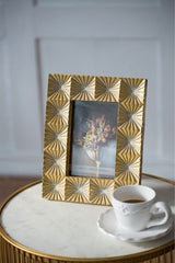 Elegant 4x6 photo frame in polyresin with glass cover, perfect for displaying cherished memories in any decor.