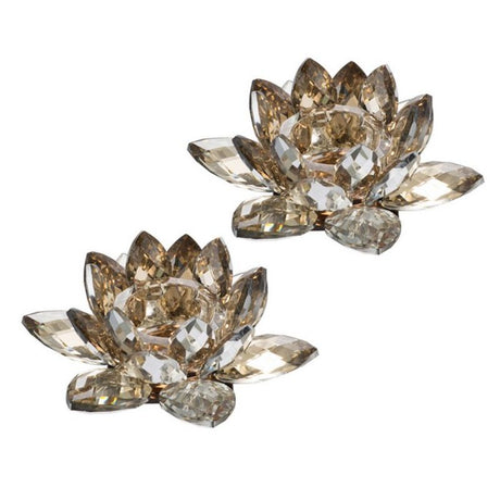 Elegant set of 2 lotus candle holders with a gold shimmer, perfect for tea lights and enhancing any decor.