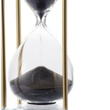 Elegant hourglass in black and brass finish, showcasing graceful curves and enhancing any decor, measuring 25.4cm.