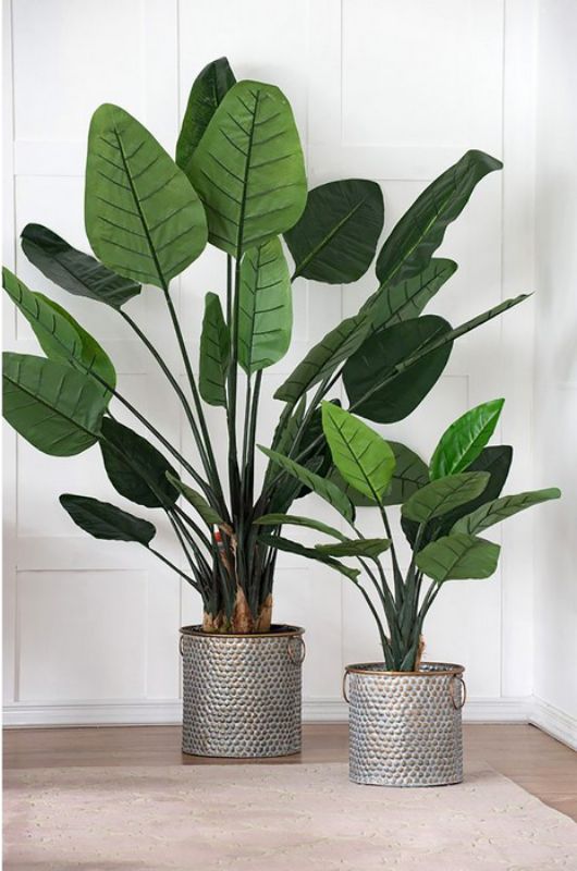 Set of 3 metal planter pots with copper band, perfect for stylishly showcasing plants indoors or outdoors.