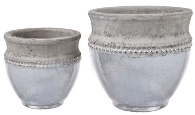 Set of 2 silver and stone planters, stylishly showcasing plants with durability and optimal drainage for modern decor.