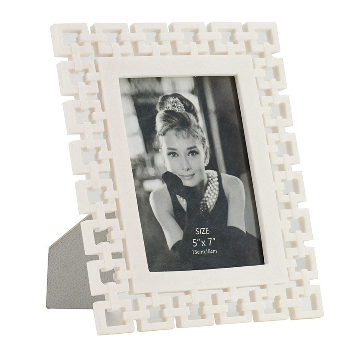 Elegant resin photo frame (5 x 7") for displaying cherished memories with a sophisticated touch in any room.