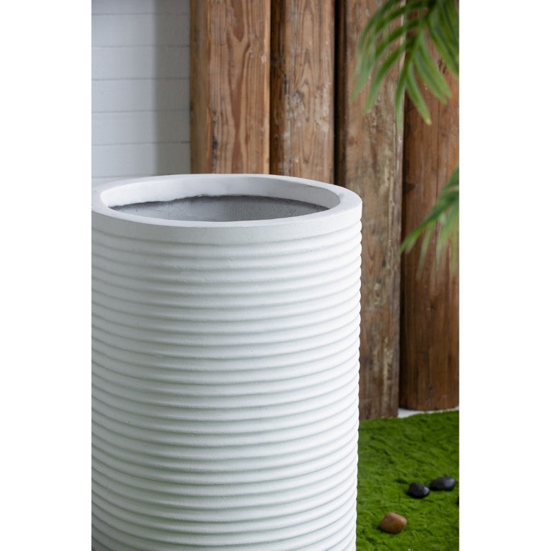 Rustic white planter (47 x 75 cm) enhancing indoor/outdoor spaces; durable, elegant design for larger or multiple plants.