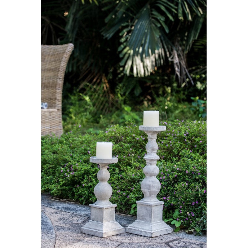 Tall modern candle holder, 16.5 x 51 cm, perfect for creating ambiance with pillar or tapered candles in any decor.