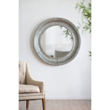 Round metal mirror (11.5 x 11cm) with sleek frame, perfect for makeup, decor, and small spaces, enhancing interior elegance.