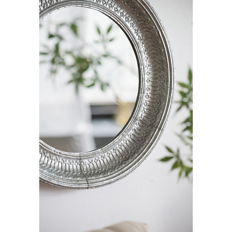 Round metal mirror (11.5 x 11cm) with sleek frame, perfect for makeup, decor, and enhancing small spaces.