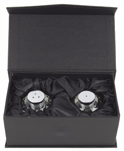 Elegant crystal salt and pepper shakers with a 60mm diameter, perfect for seasoning and enhancing any dining experience.