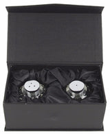 Elegant crystal salt and pepper shakers with a 60mm diameter, perfect for seasoning and enhancing any dining experience.