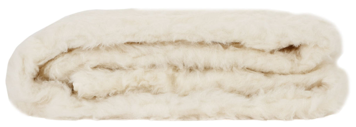 Luxurious Super King wool underlay with cotton reverse, offering breathability, comfort, and a secure fitted skirt for restful sleep.