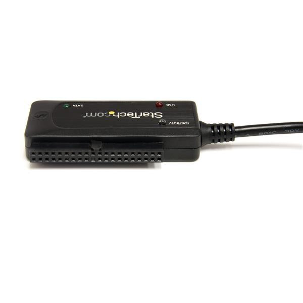 USB 2.0 to SATA/IDE combo adapter connects 2.5"/3.5" drives, ideal for data transfer and recovery. Lightweight and portable.