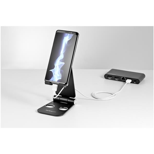 Universal adjustable smartphone and tablet stand made of durable aluminum, perfect for hands-free viewing and portability.