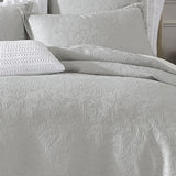 Luxurious Super King Duvet Cover Set with floral design, textured surface, and silver braid for refined elegance.