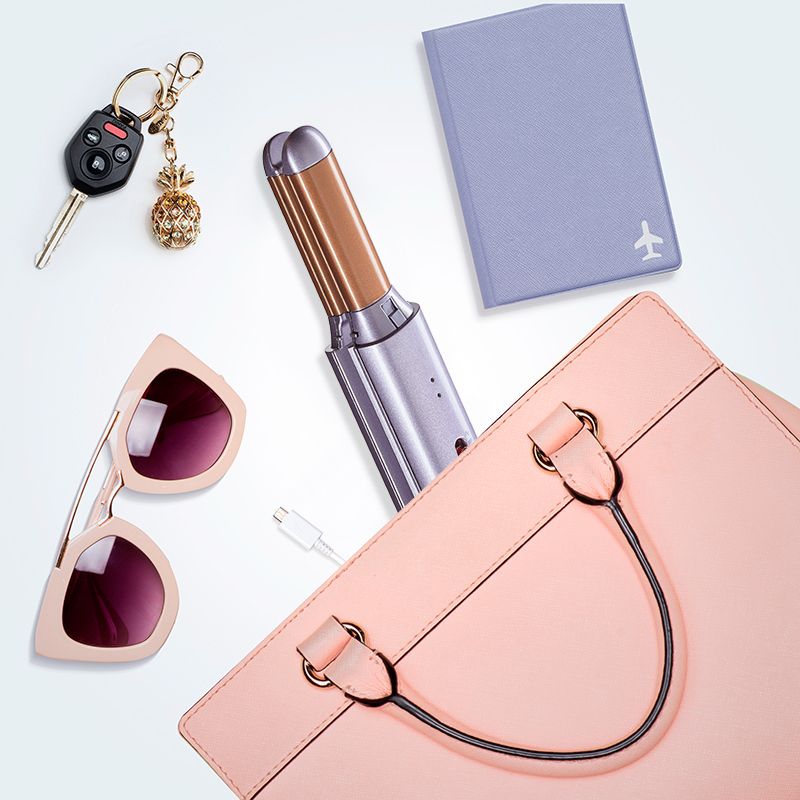 Versatile VS Sassoon Unbound Cordless mini straightener and curler, lightweight with 2-in-1 functionality for travel-friendly styling.