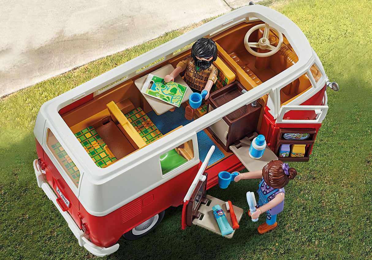 Playmobil Volkswagen T1 Camping Bus: red and white replica with detailed interior, removable roof, and two figures for adventurous play.