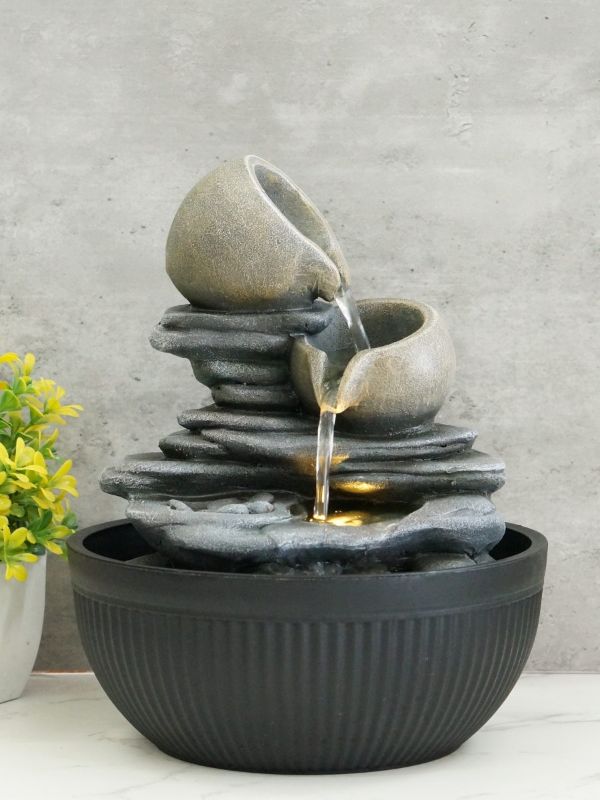 Indoor Zen water feature, 25cm, with warm white light; promotes tranquility and enhances home decor. Perfect for relaxation.