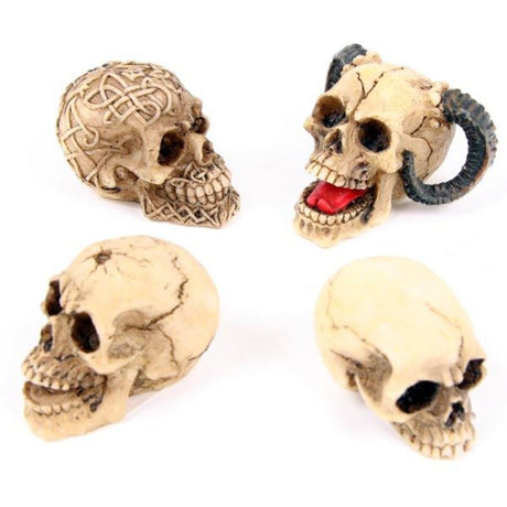 Set of 12 unique skull figurines, 2-5cm tall, perfect for Halloween decor and creative displays.