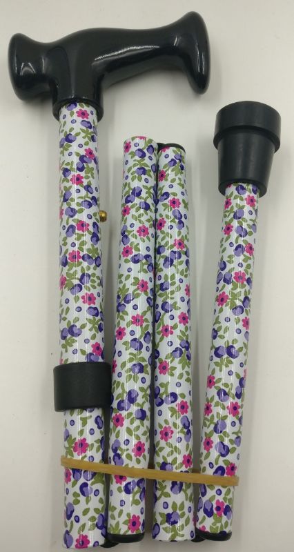 White floral walking stick, adjustable 80-92cm, folds into four sections for easy storage, ideal for stylish mobility support.