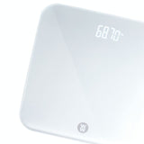 Sleek digital body weight scale with hidden LED display, weighing up to 182kg, crafted from tempered safety glass.