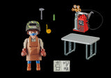 Playmobil Welder set featuring a detailed figure with welding tools, encouraging imaginative play and fine motor skill development.