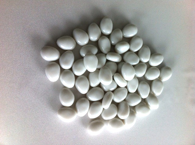 A collection of 45+ white acrylic stones, each 4cm, ideal for elegant decorations in various creative projects.