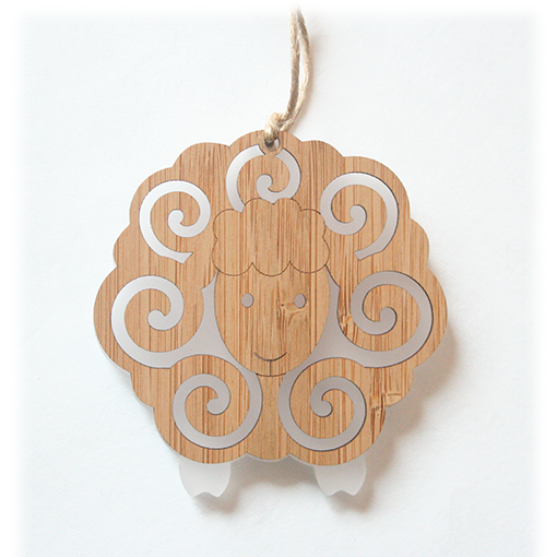 White sheep ornament made of bamboo and satin acrylic, ready to hang, ideal for home decor and gifting.