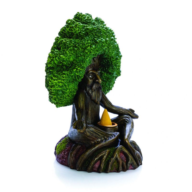Magical backflow incense burner shaped like an ancient tree, creating mesmerizing smoke waterfalls for relaxation.