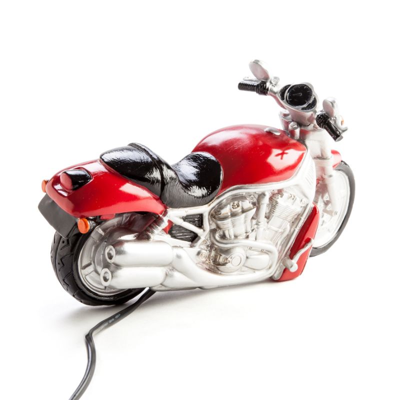 Motorcycle-shaped LED table lamp, 29cm tall, emits a warm glow, perfect for themed decor and children's rooms.