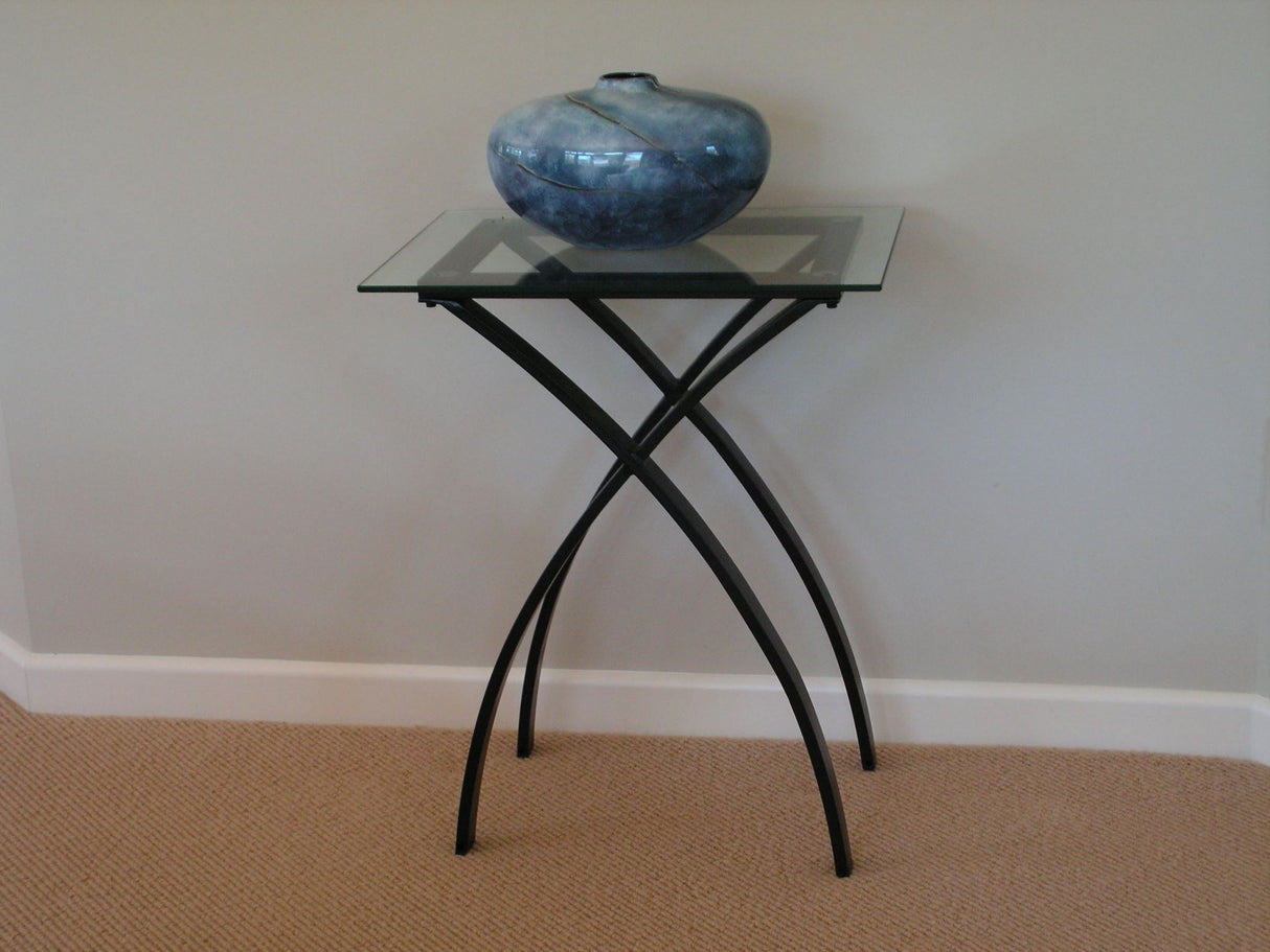 Stylish black iron side table, 49x33x61cm, perfect for modern decor and versatile use in any room.