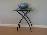 Stylish black iron side table, 49x33x61cm, perfect for modern decor and versatile use in any room.