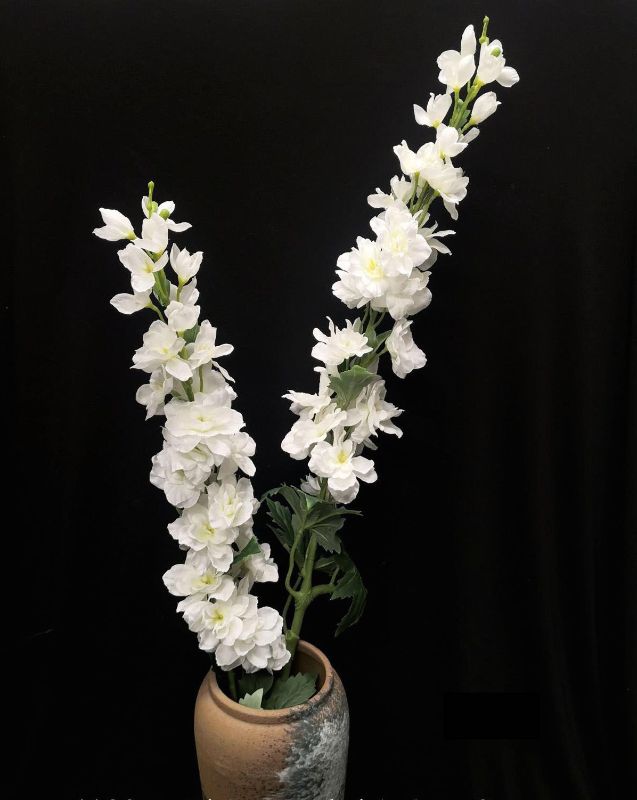 Lifelike large white artificial delphinium spray, perfect for elegant home decor and floral arrangements.