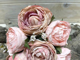 Artificial rose posies in TT pink featuring six lifelike flowers, perfect for elegant home decor with a dry look.