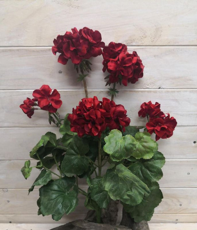 Large red artificial geranium bush, perfect for vibrant decor with low maintenance, ideal for indoor or outdoor settings.