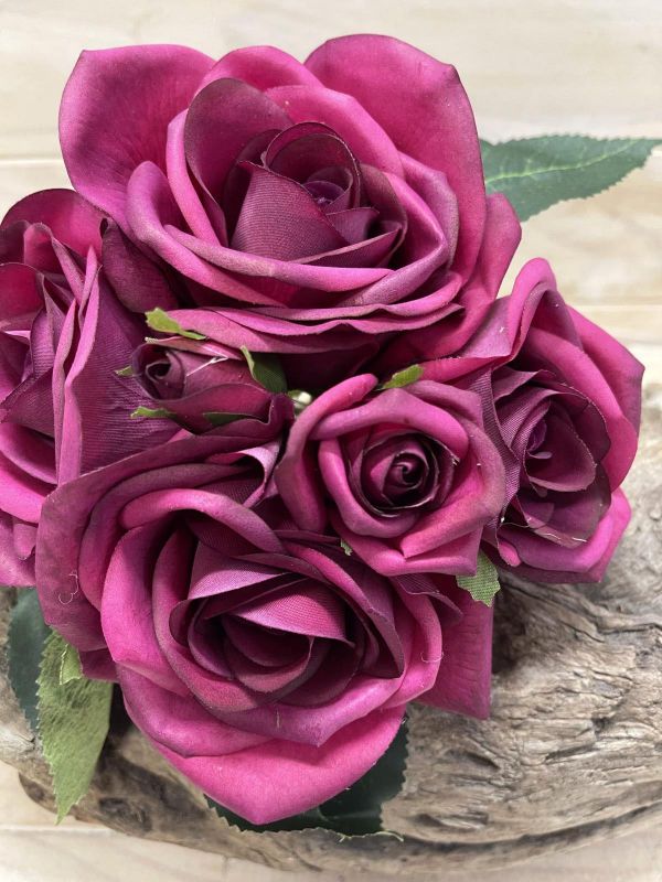 Lifelike purple artificial rose posies offering elegance and maintenance-free beauty for home decor and special events.
