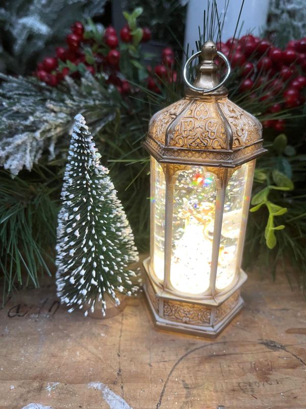 Elegant 14cm angel lamp casting warm light, perfect for creating a serene atmosphere in any room.