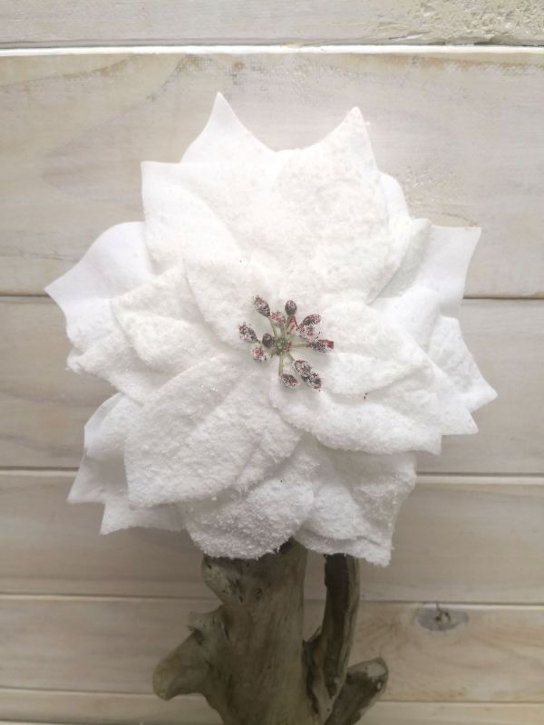 Elegant white artificial poinsettia with snow detail, perfect for festive decor, featuring a 16cm diameter for versatile arrangements.