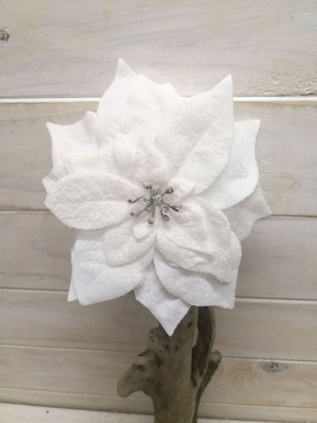 Artificial white poinsettia with glitter, perfect for festive decor and elegant holiday arrangements.